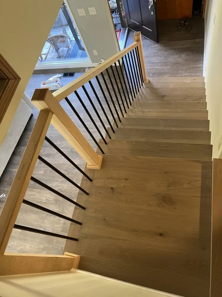 Staircase with new treads and stairnose by FED Builder